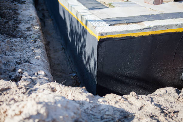 Professional Basement Waterproofing technician working in Springfield, OH
